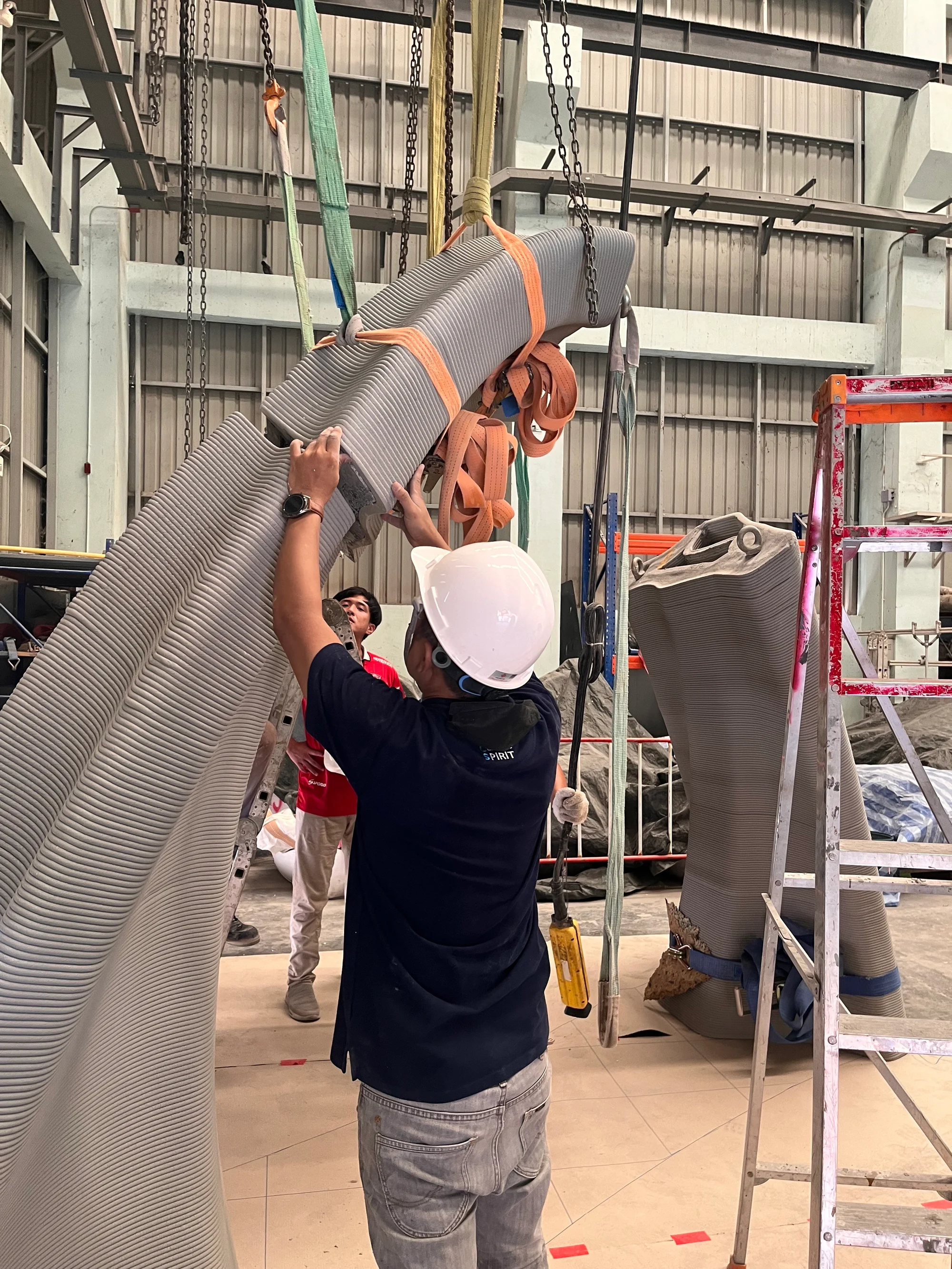Robotic fabrication of a concrete arch segment in the workshop